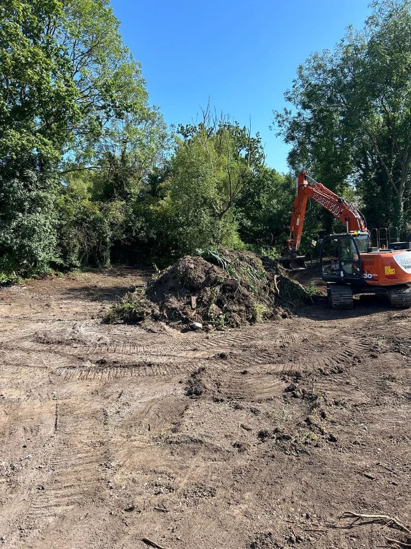 Site preparation and vegetation clearance for drainage pond